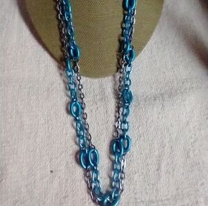 Claire's silvertone blue anodized aluminum necklace